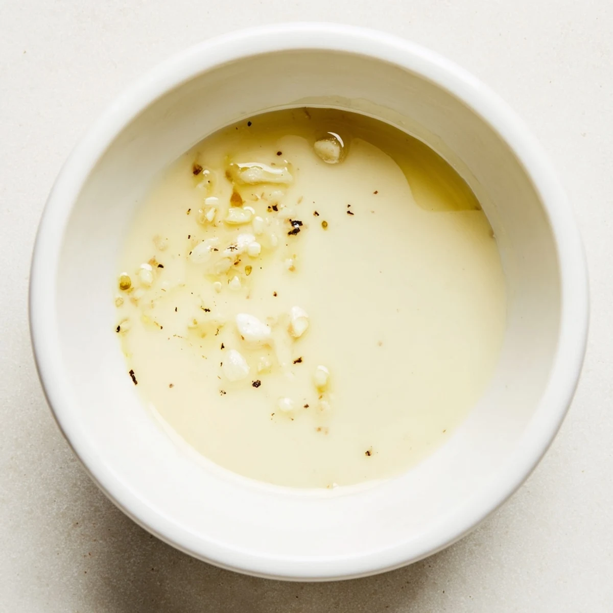 Homemade Lemon Dijon Dressing emulsified to creamy perfection, ready to toss with roasted vegetables.