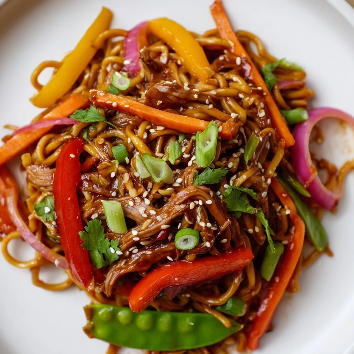 Brightly colored Sweet Chilli Turkey Noodle Stir Fry with tender turkey and crisp bell peppers in a glossy sauce.