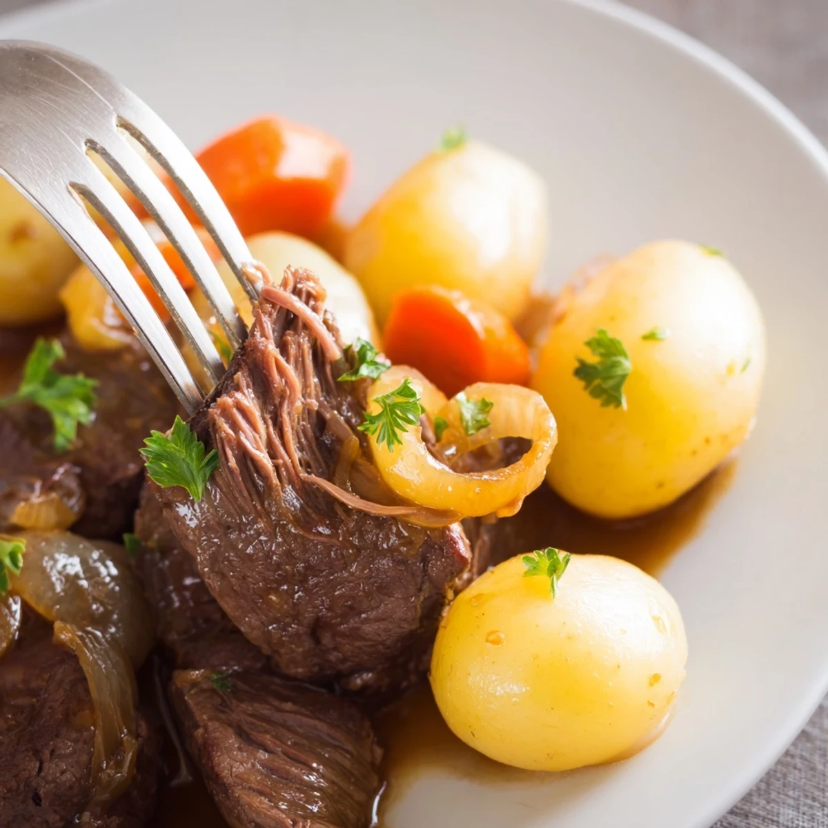 Savory slow cooker steak and potatoes featuring buttery baby potatoes and seared beef steaks