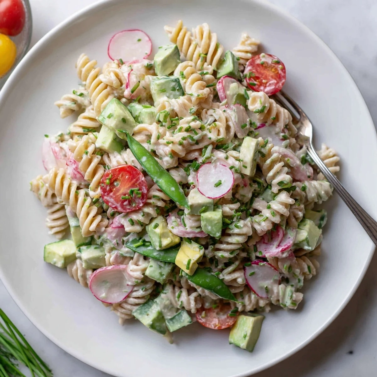 Green Goddess Pasta Salad with creamy dressing, bright herbs, crisp snap peas
