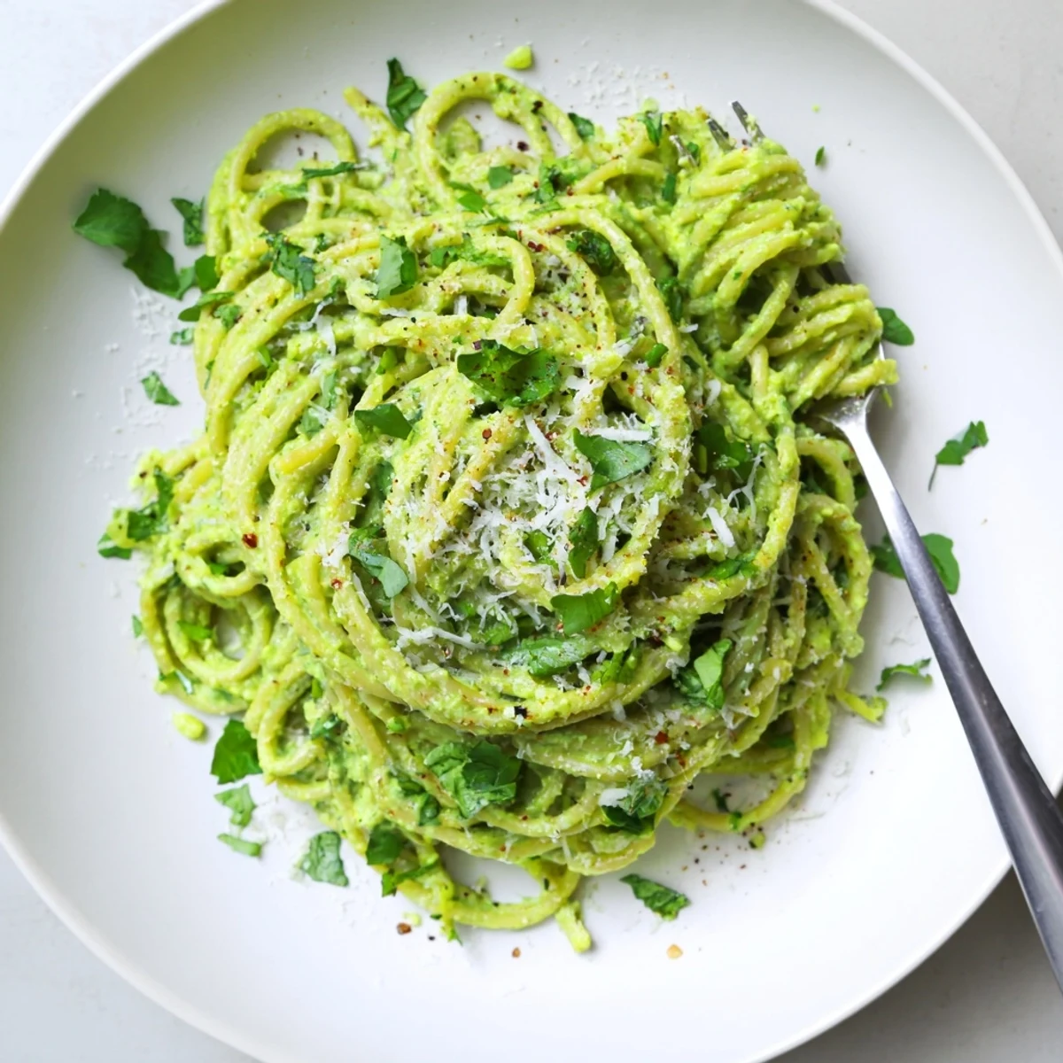 Creamy green goddess pasta sauce tossed with al dente noodles and fresh herbs